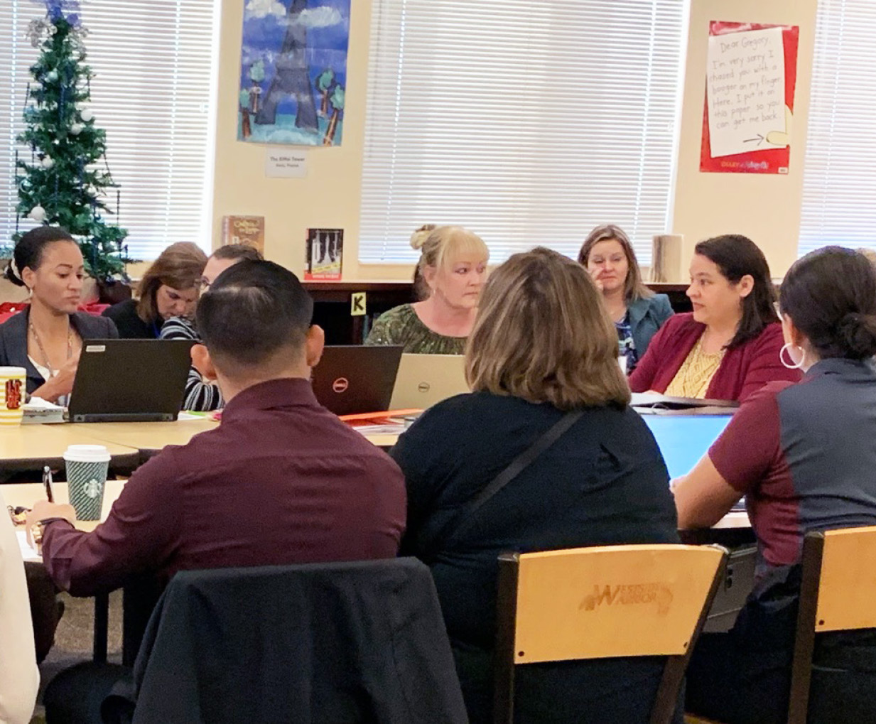 Westside Principal Christie Ray, asks a question of her team members during a Stocktake.