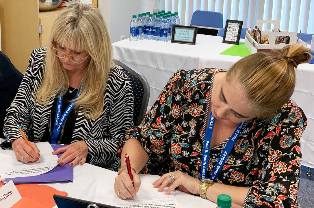 Cadre members Tricia Fernandez and Lisette Alves from Miami-Dade County Public Schools reflect on the day’s learnings.