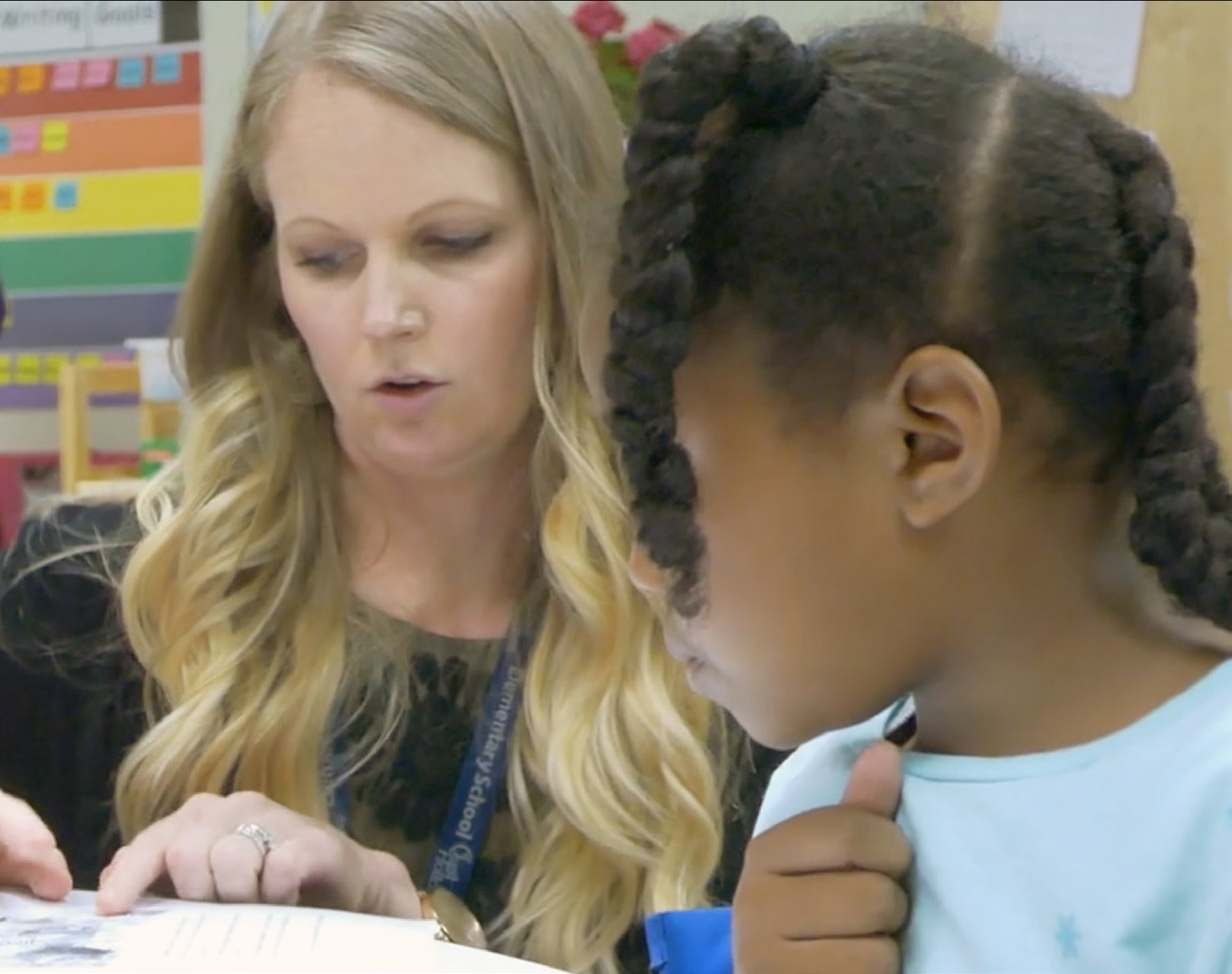 Cadre members observe as a Pasco teacher engages a student during a Learning Walk.